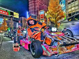 Tourists in go-karts near Tokyo landmarks